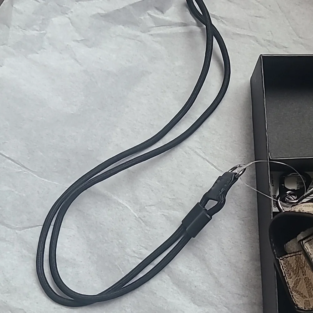 Michael Kors Black and Gold Airpod Case